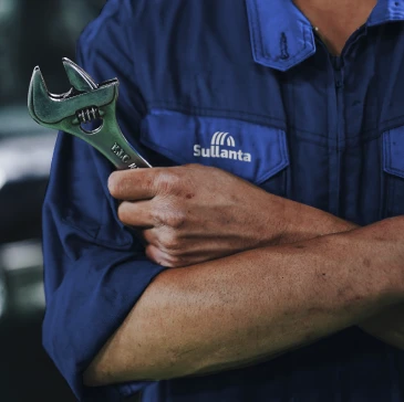 mechanic holding tools in sullanta